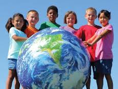 six diverse children around a globe